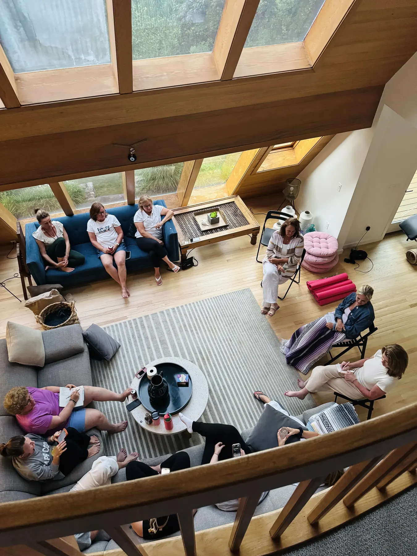 Women gathered in a bright living room during an It's Lifey retreat